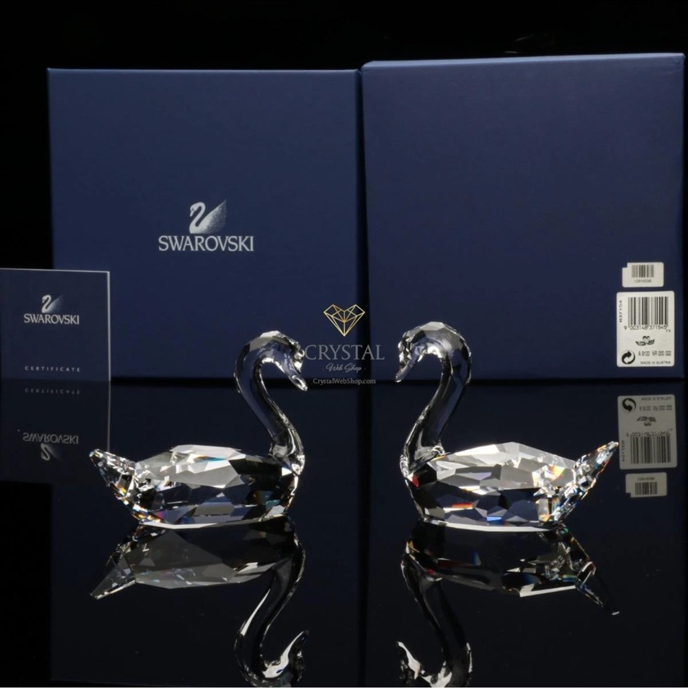 Swarovski crystal Flirting Swans figurines pair
